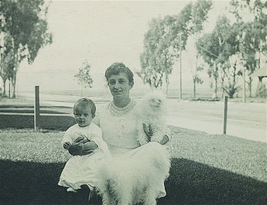 Jane - age 6 months - with Mom and dog